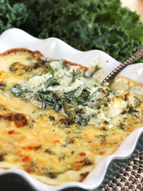 Super easy to make, Cheesy Kale Gratin Recipe is the perfect holiday side dish. Family approved! | TheSuburbanSoapbox.com