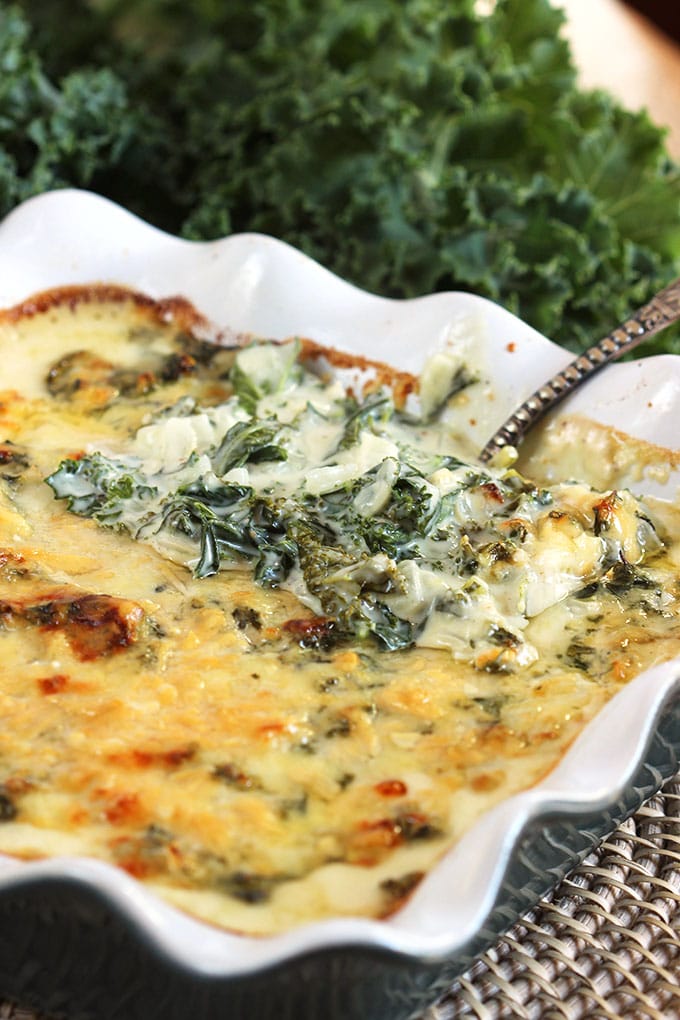 Super easy to make, Cheesy Kale Gratin Recipe is the perfect holiday side dish. Family approved! | TheSuburbanSoapbox.com