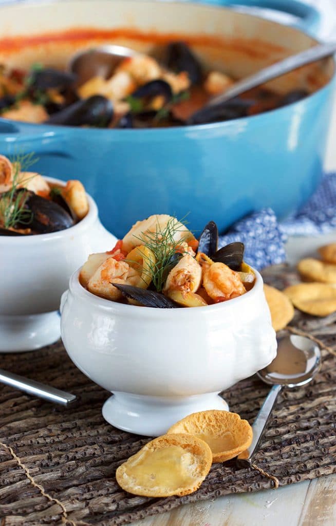French Seafood stew (bouillabaisse) in a white footed bowl from TheSuburbanSoapbox.com