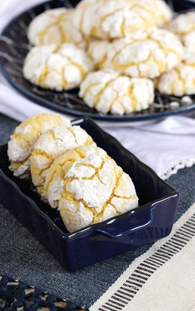 Super easy Gooey Butter Cake Cookies are made completely from scratch, no boxed cake mix needed! Butter, soft and amazing, these are a must have dessert all year long. | TheSuburbanSoapbox.com