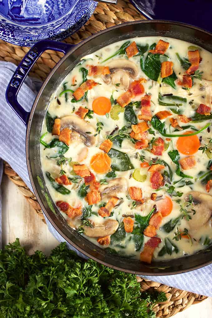 Ready in about 30 minutes, this Easy Creamy Chicken and Wild Rice Soup is simple to prepare with a rotisserie chicken! Weeknight dinner in a hurry! | TheSuburbanSoapbox.com