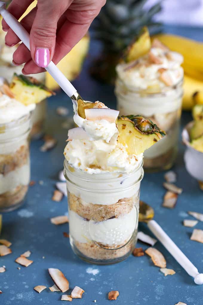 Pina Colada Banana Pudding with a spoonful on top from TheSuburbanSoapbox.com
