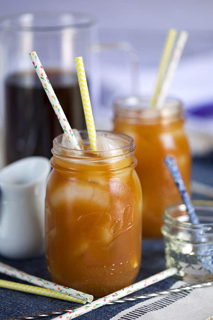 Cold Brew coffee in a mason jar with paper straws from Thesuburbansoapbox.com