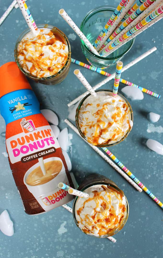 Salted Caramel Vanilla Iced Latte with Dunkin' Donuts creamer and paper straws.