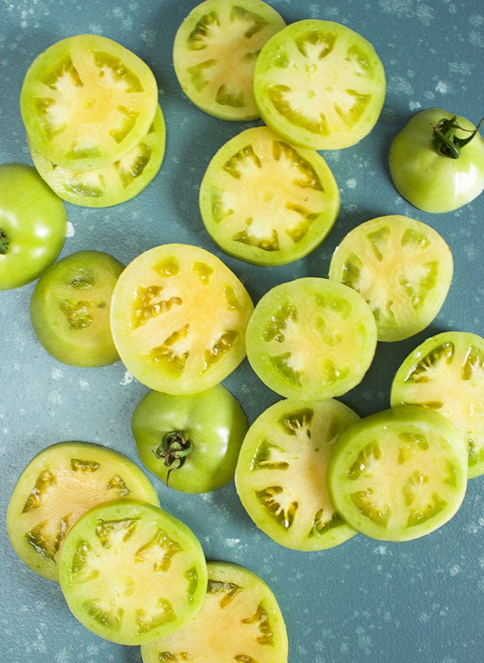 photo of sliced green tomatoes on a blue background from TheSuburbanSoapbox.com
