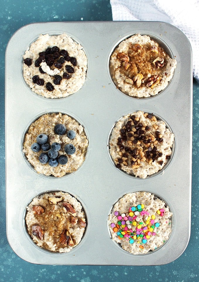 Overhead shot of muffin tin with steel cut oatmeal with various toppings from thesuburbansoapbox.com