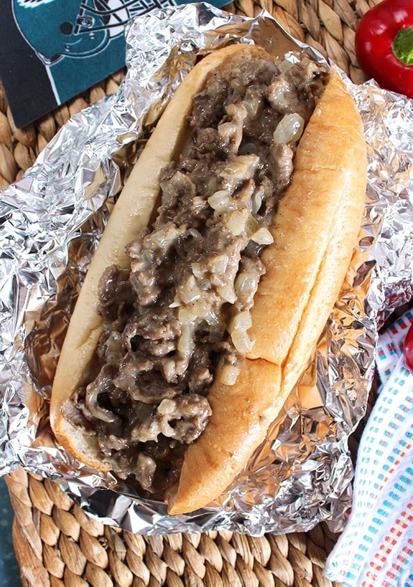 Overhead shot of authentic Philly cheesesteak in foil.