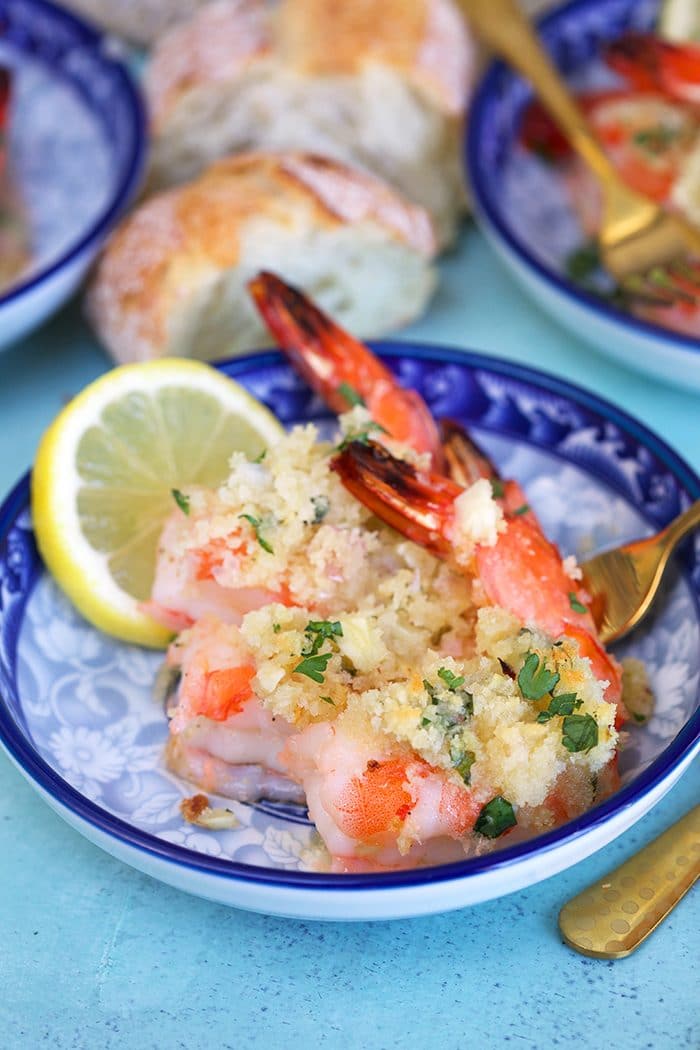 Baked Shrimp Scampi recipe on a blue and white plate.