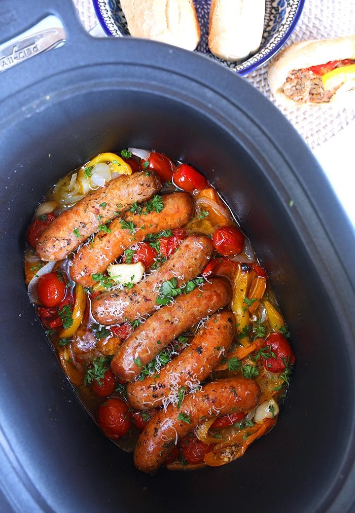 Overhead shot of Italian Sausage and Peppers in a slow cooker.