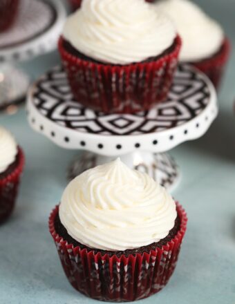 Chocolate cupcakes with whipped cream cheese frosting.
