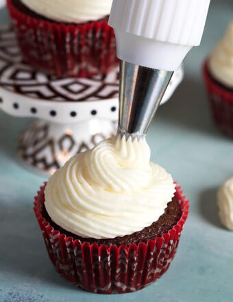 Chocolate cupcakes with whipped cream cheese frosting.