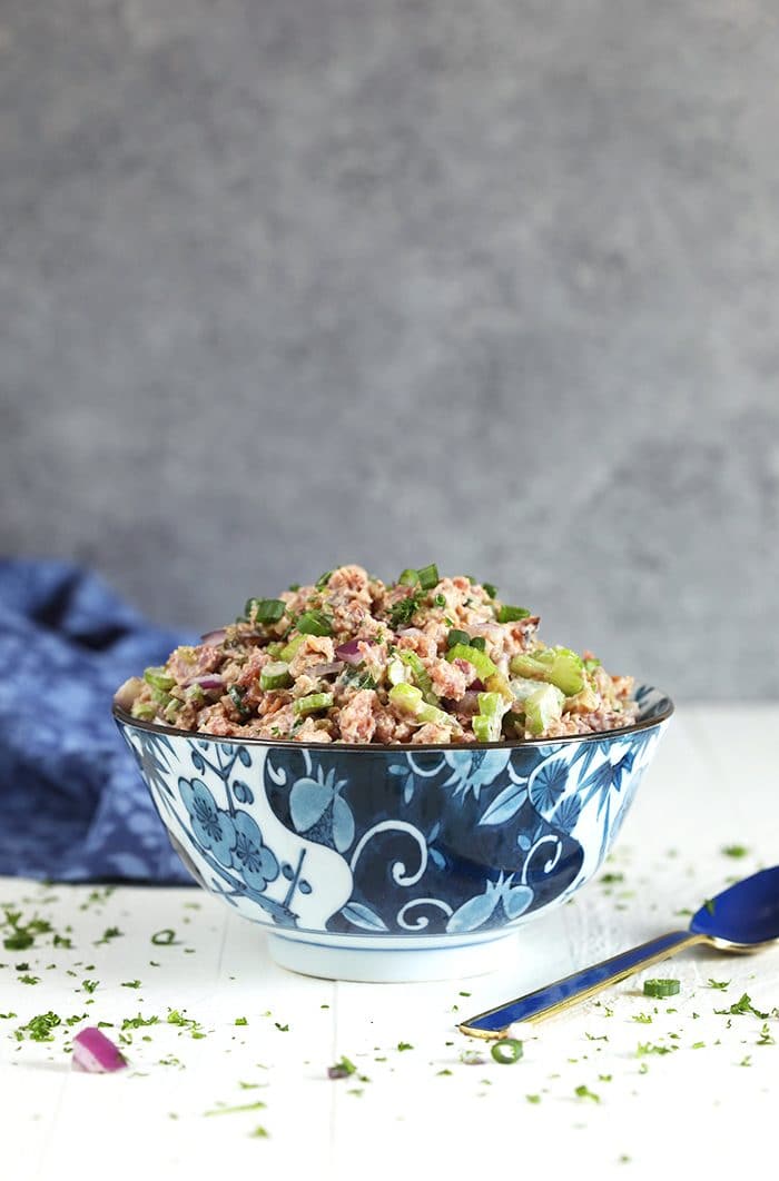 Ham Salad recipe in a blue and white bowl on a white background.