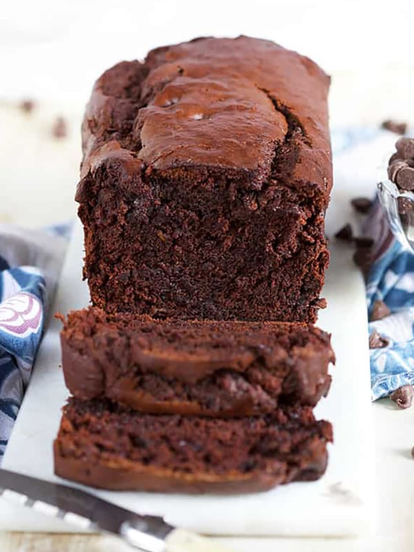 sliced chocolate banana bread on a marble board