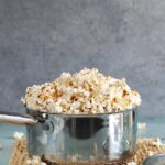 Popcorn in a stainless steel pot.