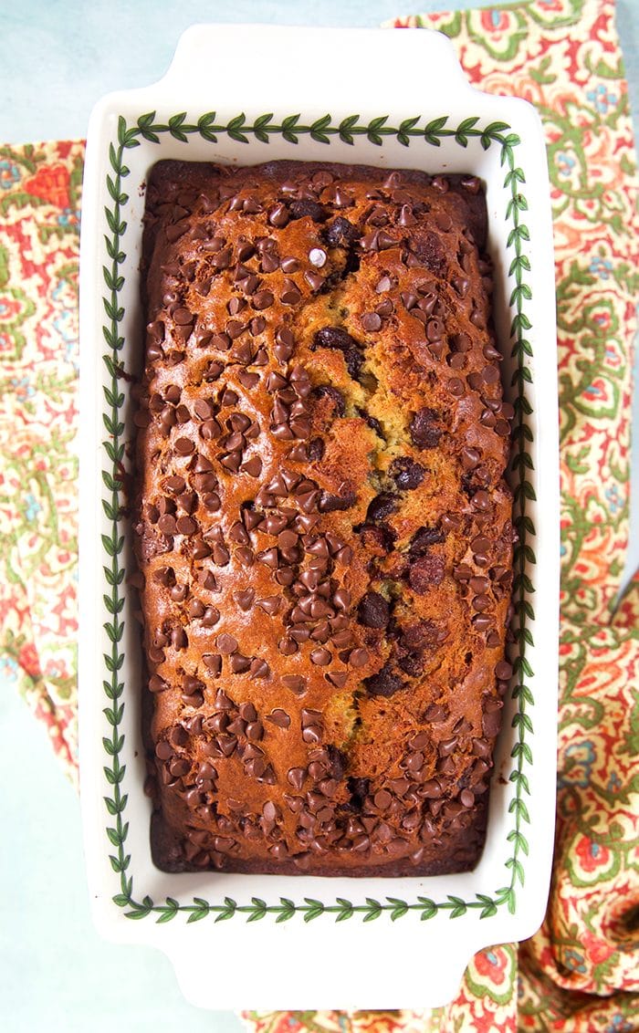 Overhead shot of Chocolate Chip Banana Bread in a ceramic loaf pan.