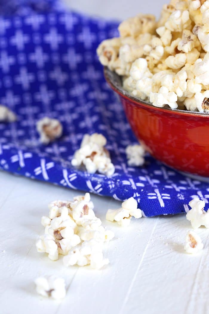 white cheddar popcorn on a blue background