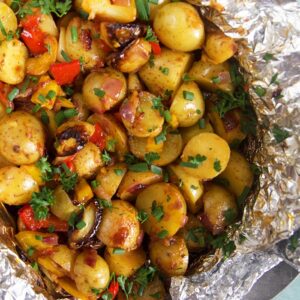 Close up of southwestern grilled potatoes in foil
