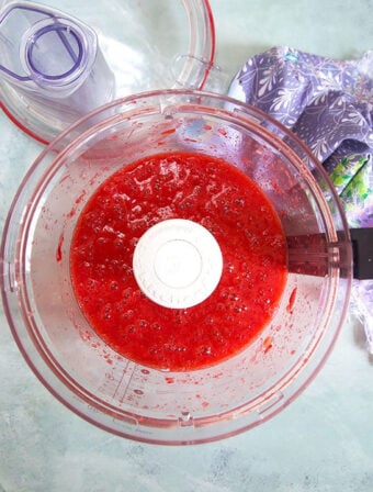 Strawberry puree in the bowl of a food processor