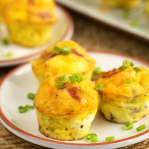 Cheddar bacon egg muffins on plate