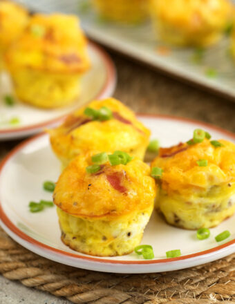 Cheddar bacon egg muffins on plate