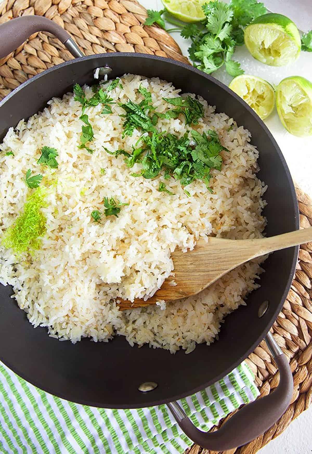 Ingredients for cilantro lime rice in a pot.