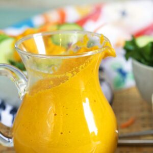 Ginger Dressing in a glass pitcher.