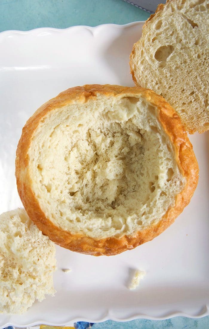 Overhead shot of bread bowl with the insides scooped out.