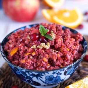 Cranberry orange relish in a blue and white bowl.