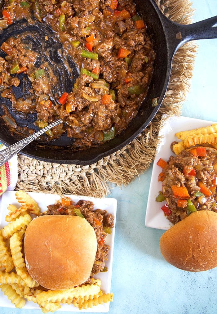 Overhead shot of philly cheesesteak sloppy joes on a plate