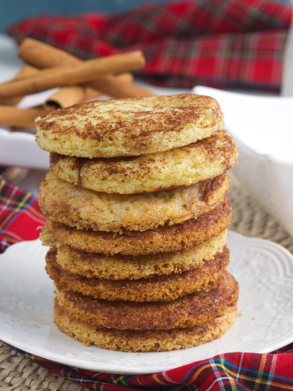 Snickerdoodle cookies on a white plate.