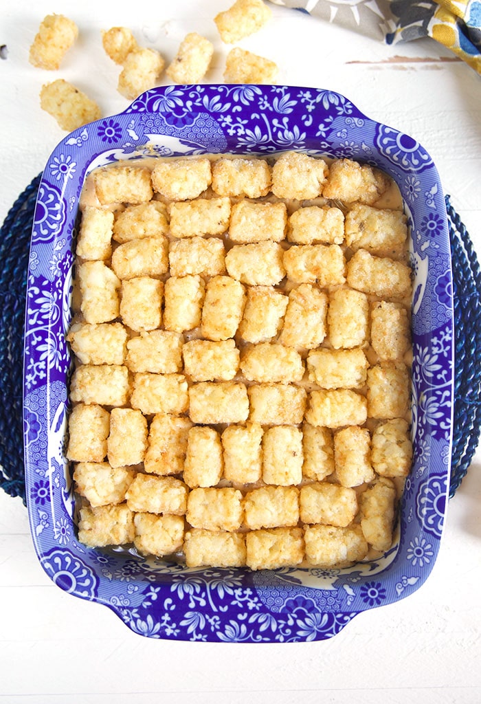 Overhead shot to tater tots in a baking dish.