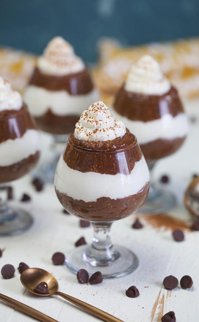 Chia seed pudding parfaits in mini brandy glasses.