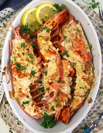 Overhead shot of Lobster Thermidor in a white baking dish.