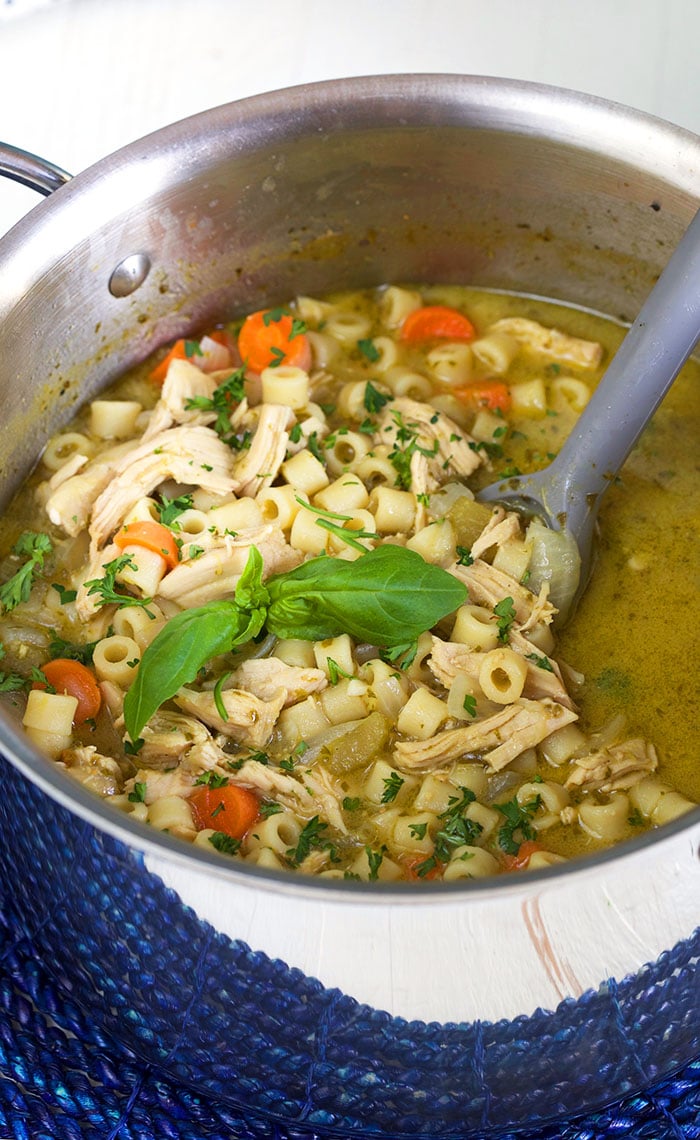 Pesto Chicken Noodle Soup in a stock pot.