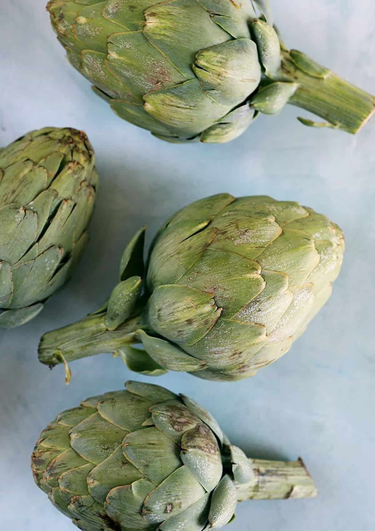 Artichokes on a blue background.