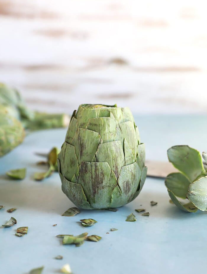 Trimmed Artichoke on a blue background