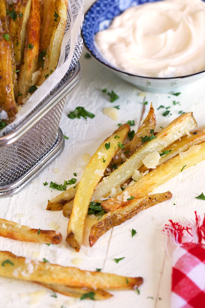 parmesan truffle fries on a white background.