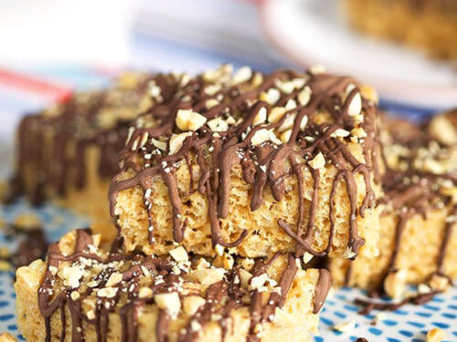 Peanut butter Rice Krispie treats with chocolate topping cut into bars