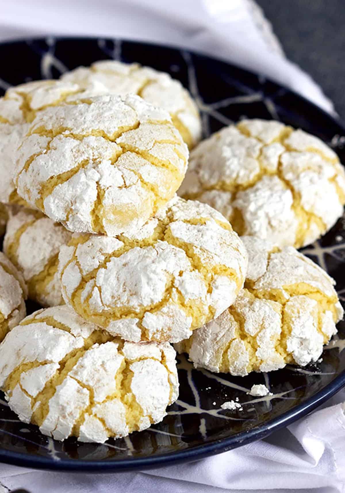 Gooey Butter Cookies piled on a blue plate.