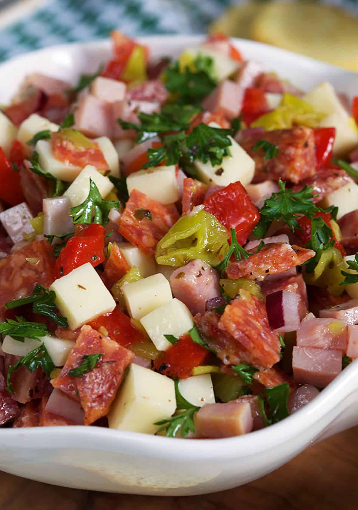 Hoagie dip mixed together in a white bowl.