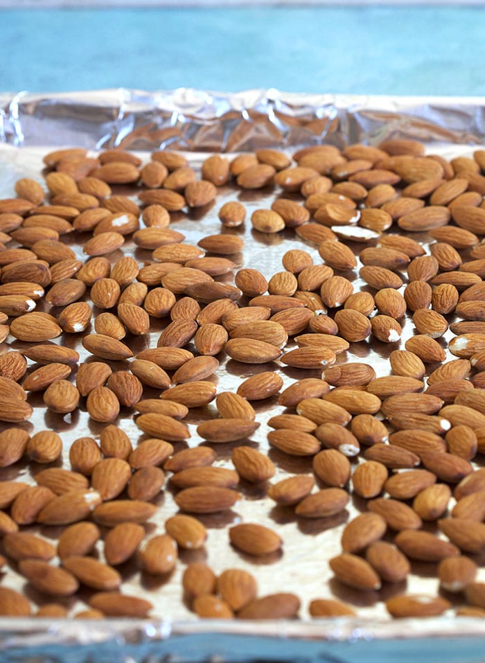 almonds on a foil lined baking sheet.