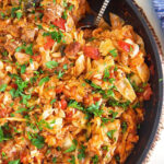 Close up of stuffed cabbage casserole in a skillet.