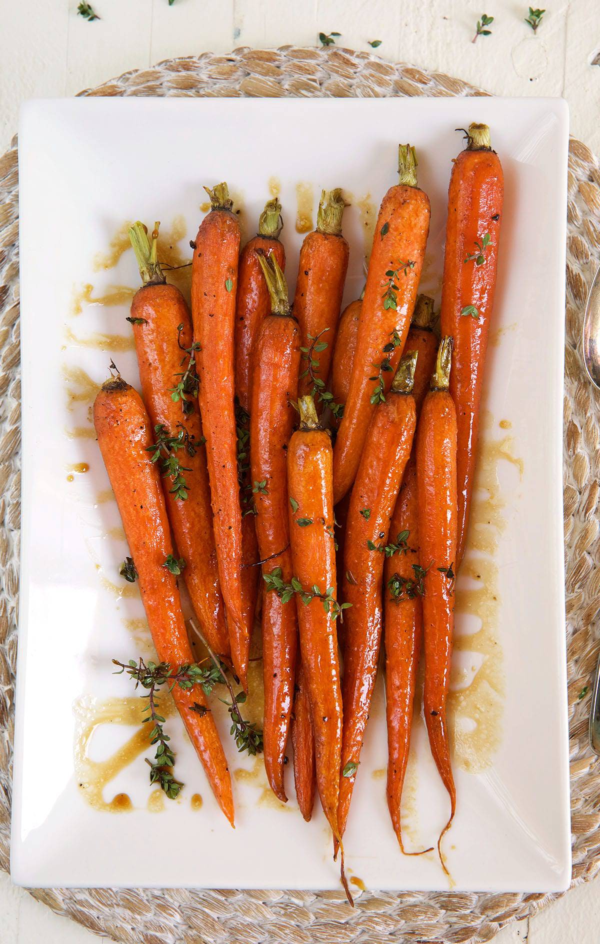 Carrots are placed in the center of a white plate.