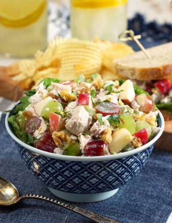 Chicken Waldorf salad in a blue and white bowl