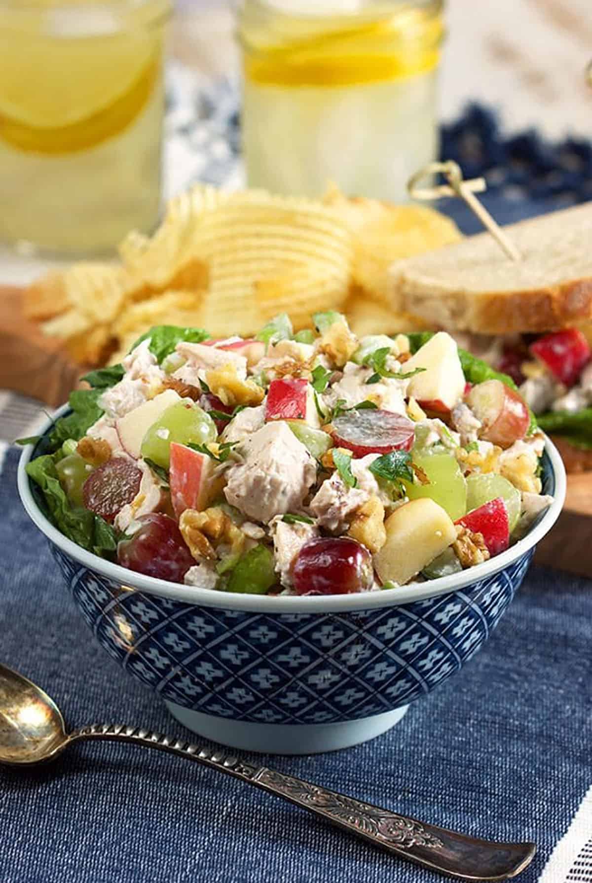 Chicken Waldorf salad in a blue and white bowl