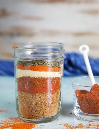 Dry Rub for chicken ingredients layered in a glass jar.