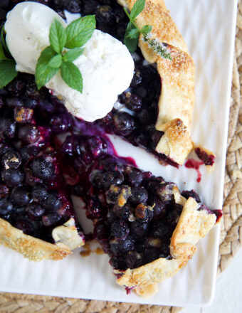 Blueberry Galette with a slice cut out of it.