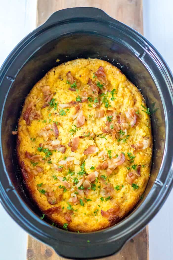 Cornbread is in a slow cooker and is fully cooked.