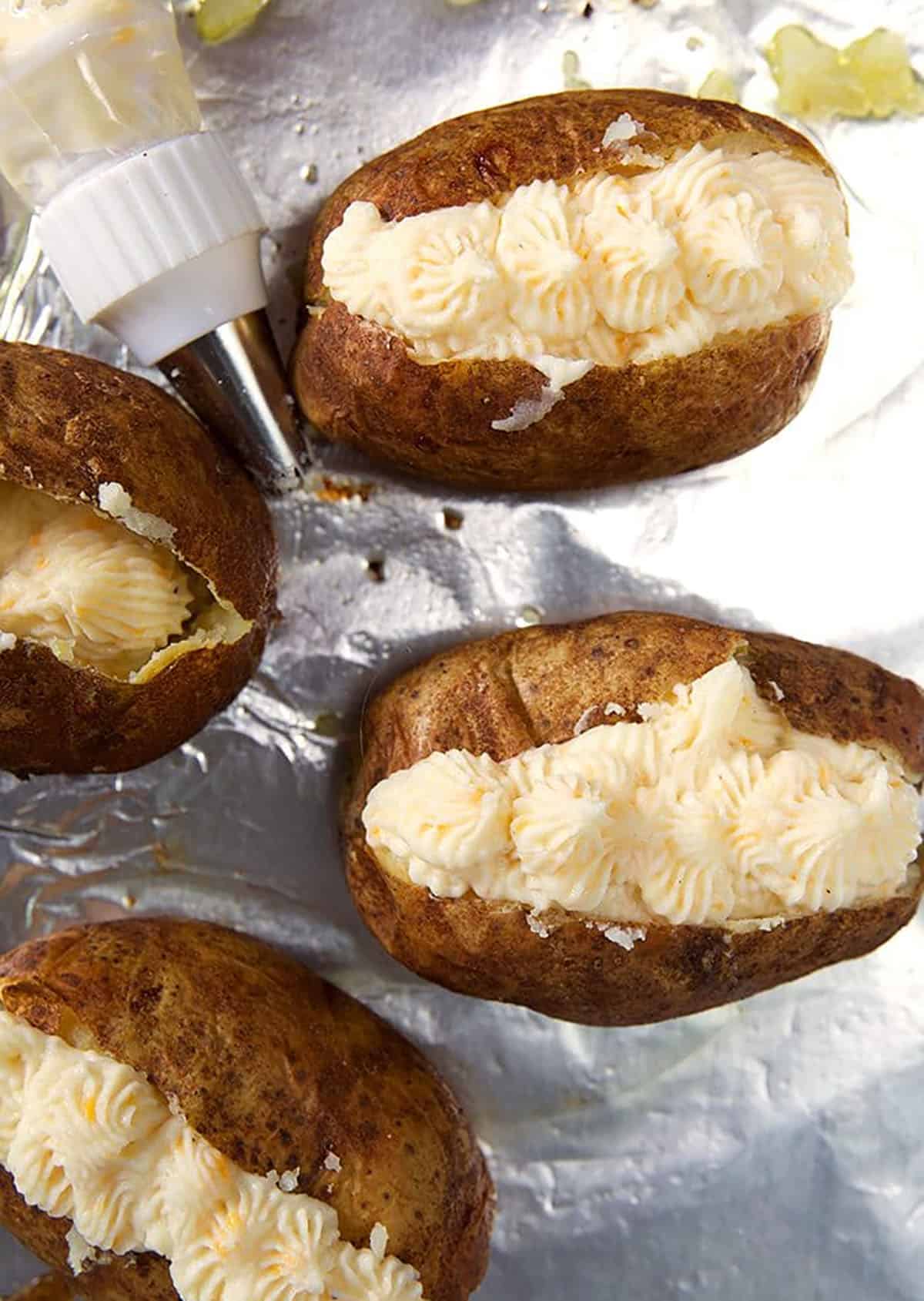 Twice Baked Potatoes filled with potato filling before being baked for the second time.