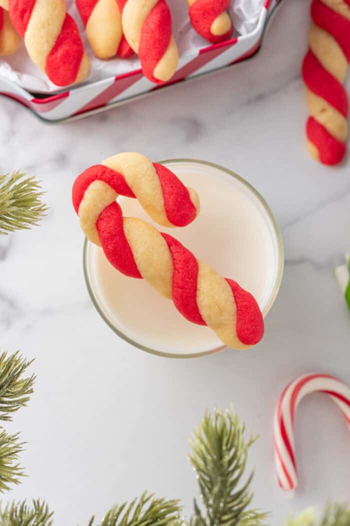 Candy Cane Cookie on top of a glass of milk